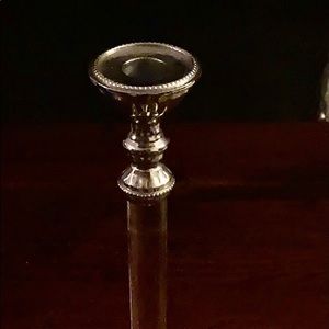 See- Through candlestick holder.